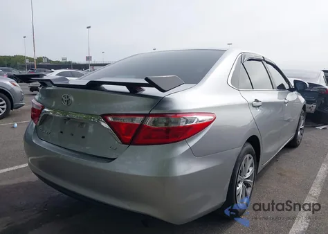 2016 Toyota Camry Le z USA, uszkodzony, nr VIN 4T4BF1FK0GR523268